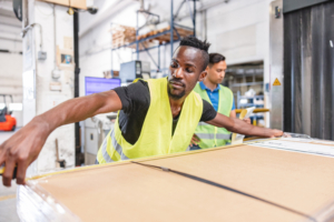 Man measuring a large parcel